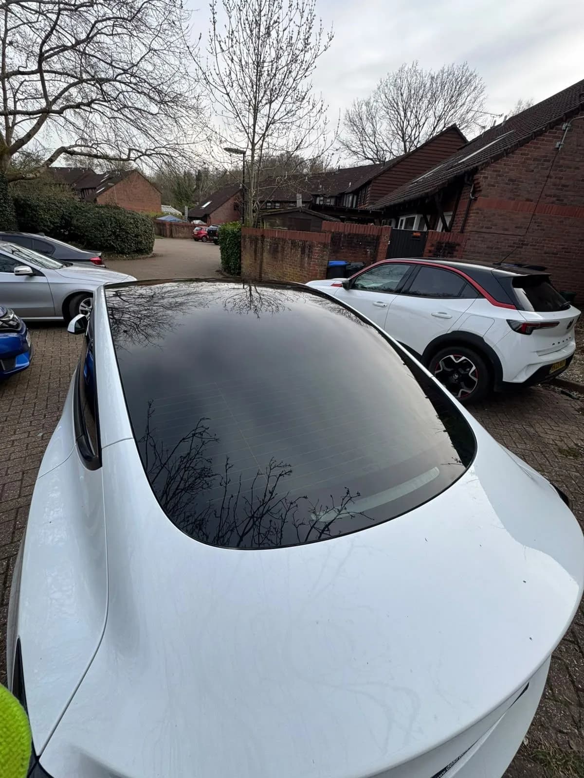 White SUV with tinted glass roof