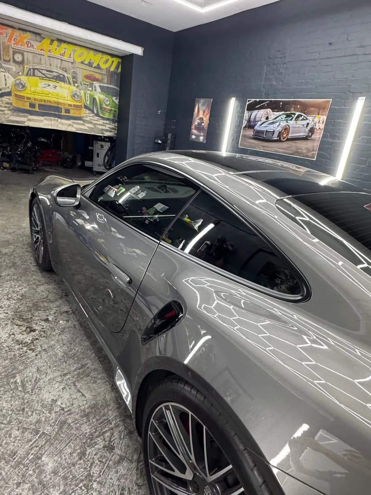Grey estate car with freshly tinted windows